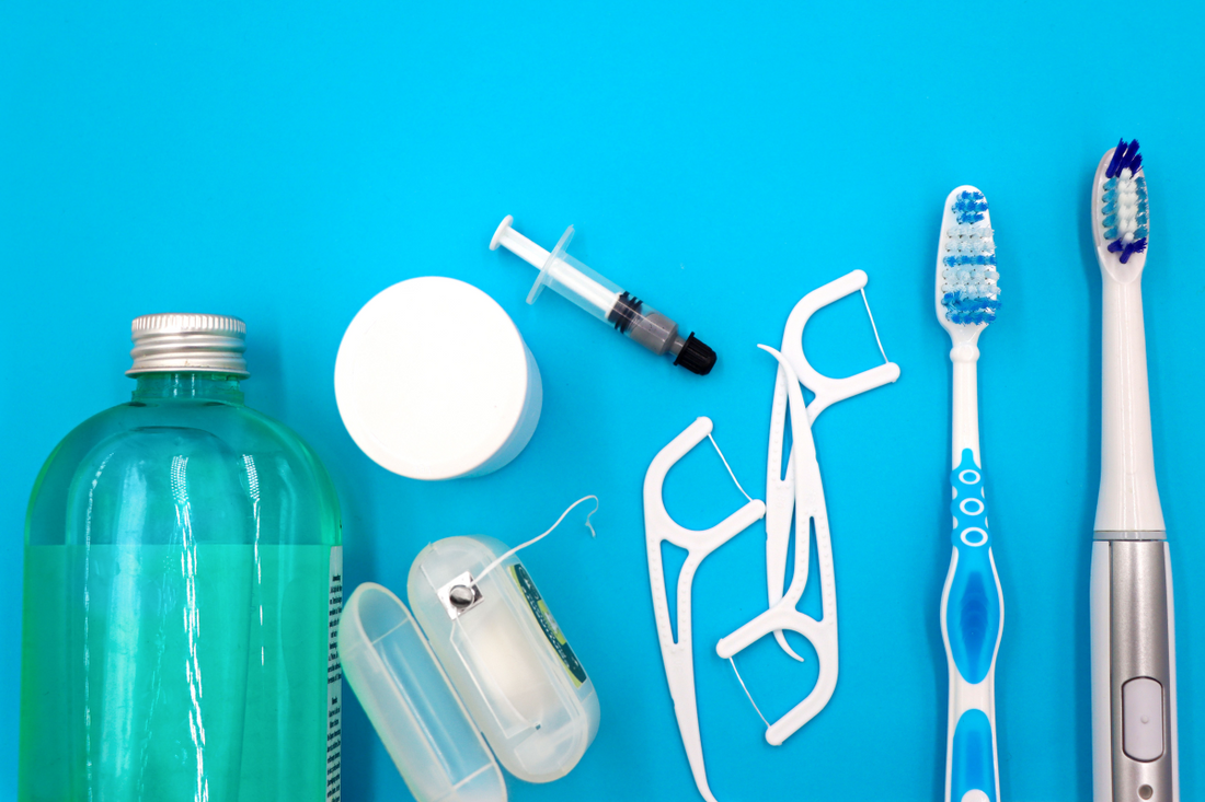 A traveler's small dental kit packed for a trip